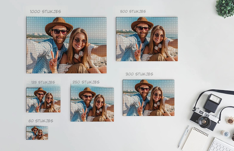 Gepersonaliseerde fotoleg puzzels: maak je eigen van 60-1000 stukjes. Voorbeeld van strandscène getoond.